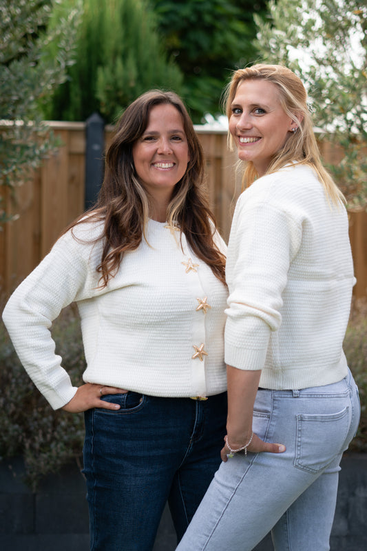 Wit vest met ster knopen – cozy chic