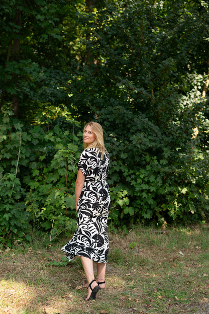Twist & Turn Jurk – speels & praktisch